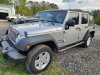 Pre-Owned 2015 Jeep Wrangler Unlimited Sport S